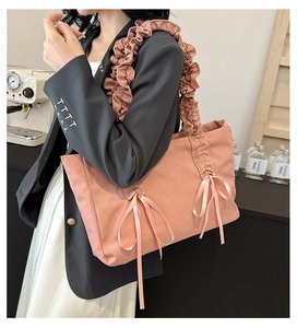 Sac fourre-tout en toile rose avec poignées à volants et élégants nœuds en ruban