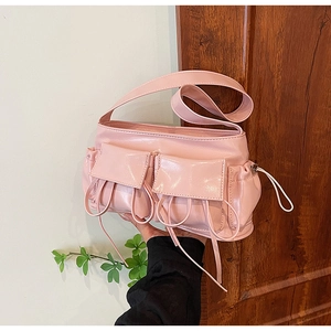 Pink PU leather shoulder bag with dual pockets and drawstring details for summer style