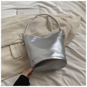 Chic silver metallic PU leather bucket bag with pearl charm and slender shoulder strap