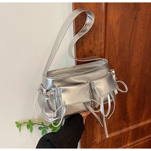 Silver metallic PU shoulder bag with dual front pockets and side drawstring details