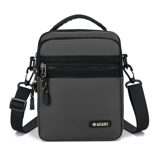 Water-resistant oxford cloth crossbody bag with multiple zip pockets and sport logo
