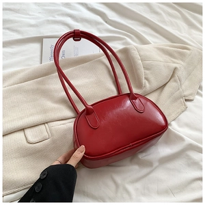 Chic red glossy PU leather shoulder bag for women with a sleek oval-shaped design