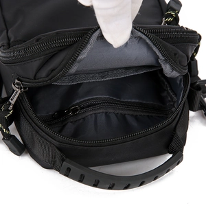 Internal view of waterproof oxford bag showing multi-layered zippers and lining
