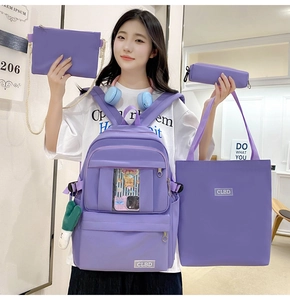 Ensemble détaillé de sac à dos en nylon violet avec fourre-tout, trousse et bandoulière