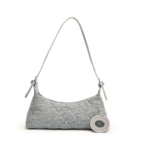Light blue denim shoulder bag with diamond quilting and sparkling rhinestone accents
