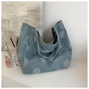 Trend denim tote bag with all-over smiley face print and spacious double shoulder straps