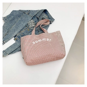 Striped canvas summer handbag in red and white with casual top handle design