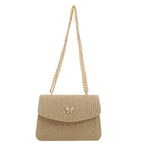 Beige woven straw crossbody bag with golden chain strap and white butterfly buckle