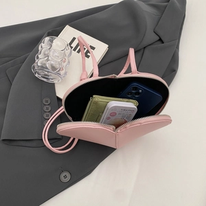 Elegante borsa a tracolla rosa a forma di cuore con doppia zip e ampio spazio interno