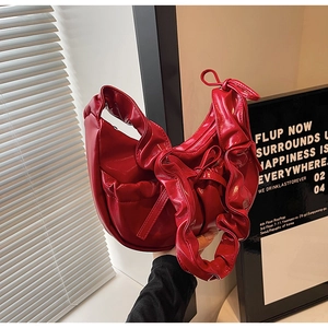 Fashionable red PU leather pleated shoulder bag with decorative bow and ruffles