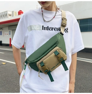 Detail of durable nylon waist bag with contrasting khaki and green paneling
