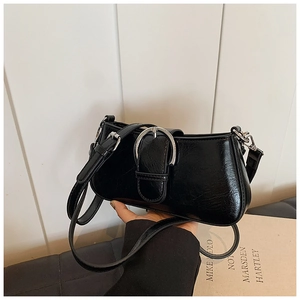 Black cracked PU leather baguette bag with silver horseshoe buckle and adjustable strap