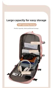 Pink travel backpack showing 180-degree opening and organized multi-compartment storage