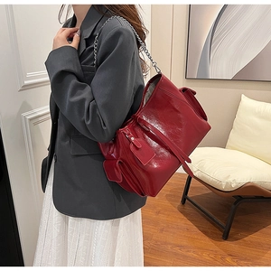 Chic red patent PU leather shoulder bag with silver chain strap and side flap pocket