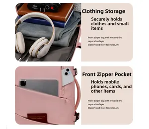 Detail view of pink water-resistant oxford backpack showing interior storage and compartments
