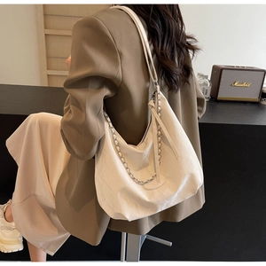 White soft PU leather crossbody bag with silver chain and pleated texture details