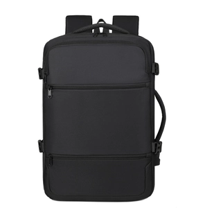 Detail view of water-resistant oxford backpack featuring multiple zippers and side handle