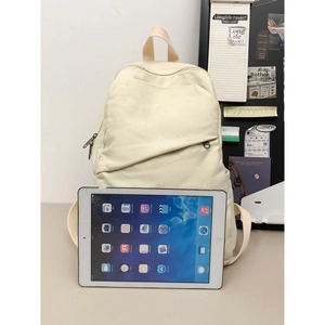 Minimalist beige canvas backpack for women with large capacity and front zipper pocket