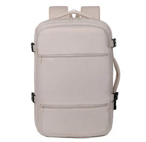 Detail view of water-resistant beige oxford backpack with double zipper compartments and side buckles
