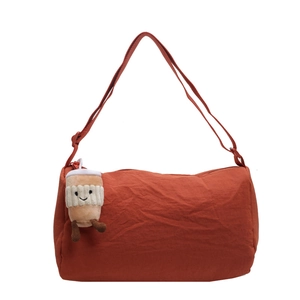 Minimalist caramel cylindrical canvas crossbody bag with cute coffee cup plush charm