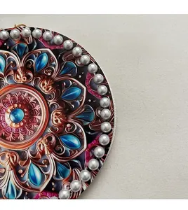 Detail of a round linen bag featuring mandala floral patterns and pearl bead edges
