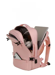 Pink water-resistant nylon backpack with laptop compartment and external USB port