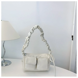 Minimalist cream white PU leather handbag with ruched shoulder strap and multi-pocket design