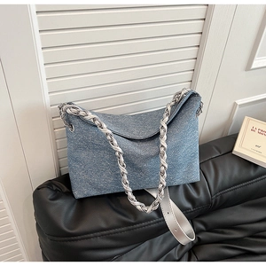 Blue denim texture PU leather tote bag with silver chain straps and slouchy design
