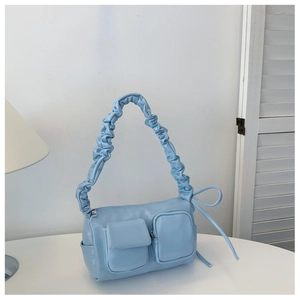 Chic light blue PU leather handbag with scrunchie handle and multi-pocket design for summer
