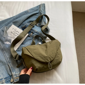 Fashionable military green nylon crossbody bag for women in a casual dumpling style design