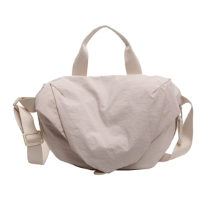 Minimalist beige crossbody bag for women with adjustable strap and versatile design