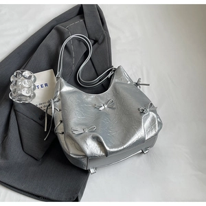 Silver metallic wrinkled PU leather hobo bag with bow details and side drawstring straps