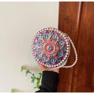 Elegant round crossbody bag with mandala pattern and pearl accents for women