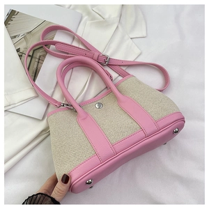 Pink PU leather and beige woven straw handbag with adjustable strap for summer