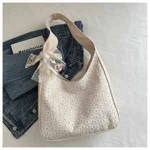 Chic cream canvas tote bag with floral lace overlay and rose embroidered ribbon bow