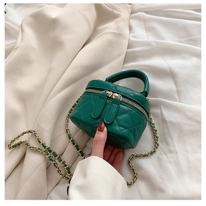 Quilted green PU leather crossbody bag with gold chain strap and dual zipper closure