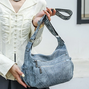 Vintage washed blue PU leather crossbody bag with ethnic print wide strap and multi-pockets