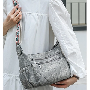 Chic grey multi-pocket PU crossbody bag with ethnic style colorful woven strap
