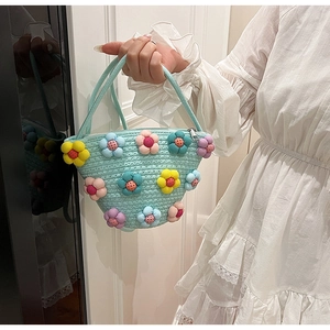 Handwoven mint blue cotton linen tote bag with colorful 3D floral accents for women