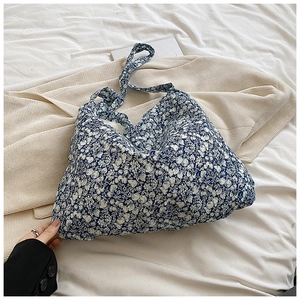 Floral print canvas tote bag in navy blue with white flowers for casual summer style