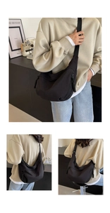 Detailed views of a black large capacity nylon crescent crossbody bag with wide strap