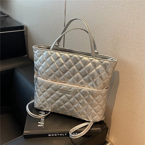 Silver quilted PU leather tote bag with metallic finish and dual handles for women