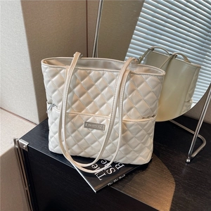 White quilted PU leather tote bag with elegant diamond pattern and dual shoulder straps