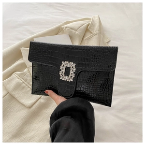 Minimalist black PU leather clutch bag with crocodile texture and sparkling rhinestone buckle