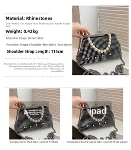 Detail of luxury black rhinestone evening bag with pearl handle and metal snap closure