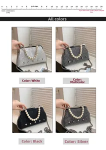 Macro detail of rhinestone evening bags with pearl handles in black silver and white