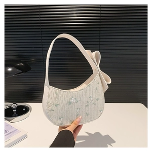 Sac à bandoulière blanc en PU et paille avec broderie florale verte et gros nœud