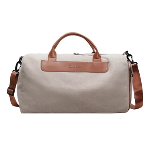 Minimalist canvas tote bag with leather handles for travel and gym use in beige color