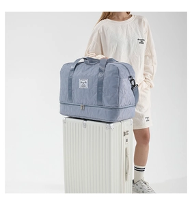 Quilted travel tote with star stitching pattern and a separate bottom shoe compartment