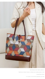 Detailed view of the 3D geometric patchwork tote bag with high-quality leather textures